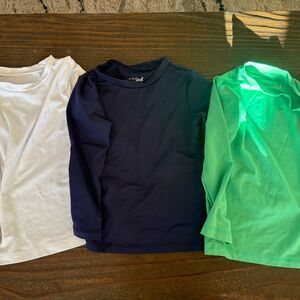 5 rashguard tops
